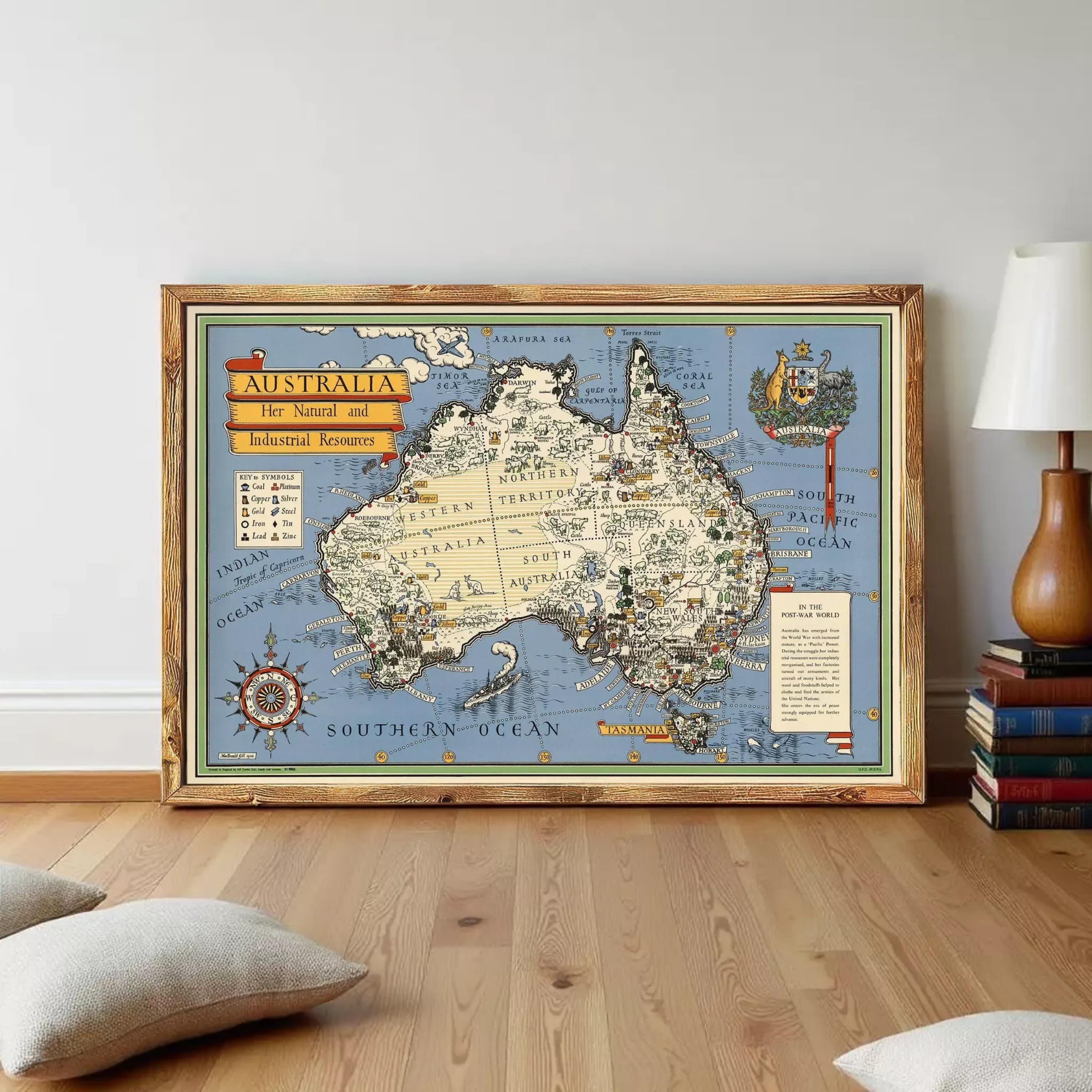 The image is a framed vintage map of Australia, depicting the country's geographical features and landmarks.