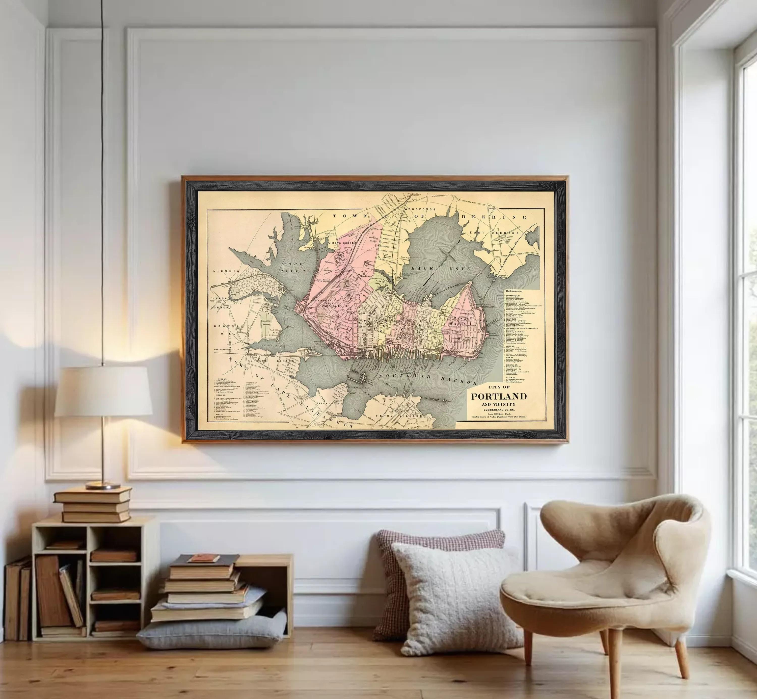 The image is a framed vintage map of Portland, Oregon, depicting the city's layout and surrounding areas.