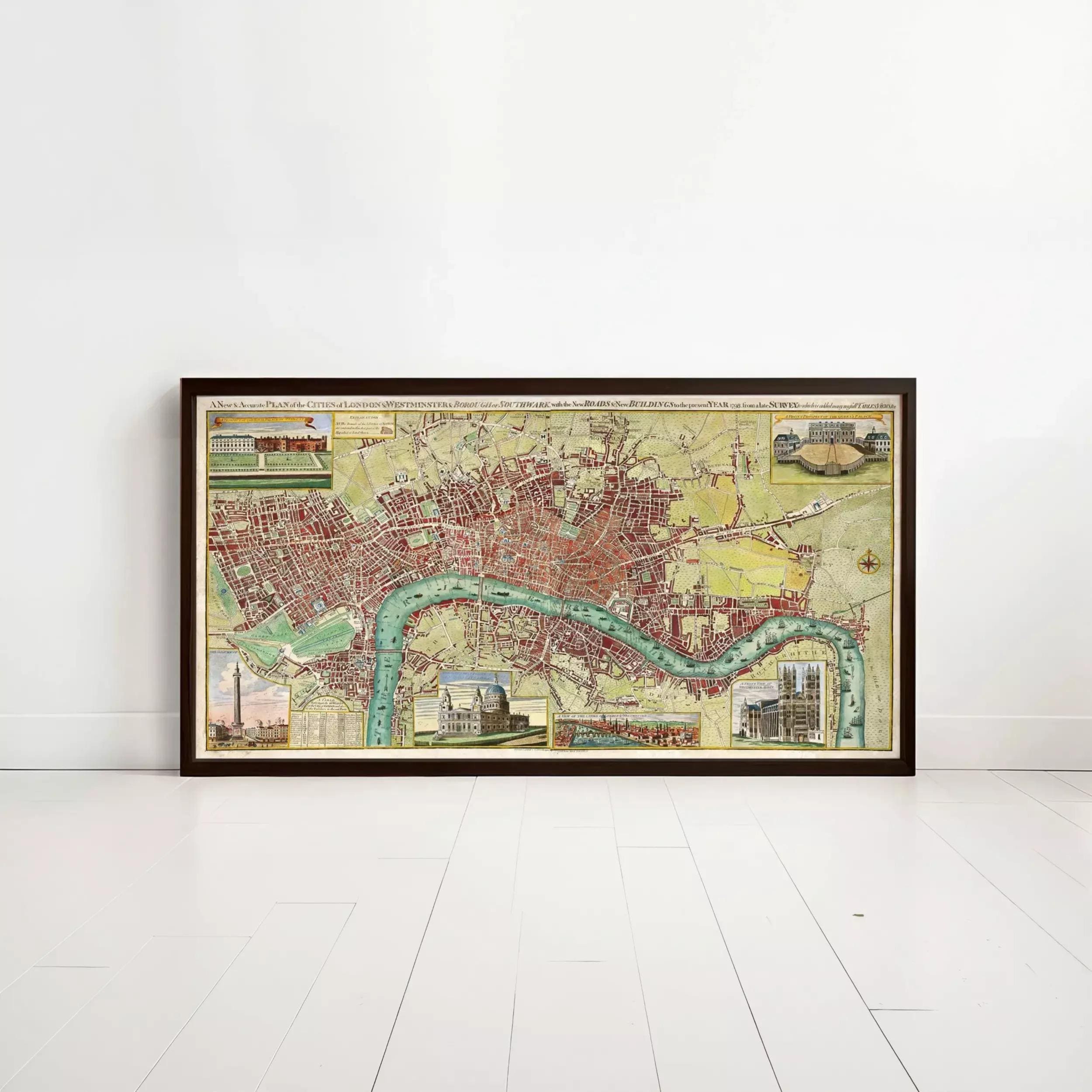 A framed map of London, England, with various landmarks and cityscapes depicted.