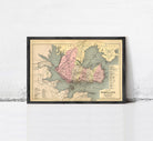 The image is a framed vintage map of Portland, Oregon, depicting the city's layout and surrounding areas.