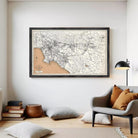 The image is a framed vintage map of Los Angeles, California, with a black border and a beige background.