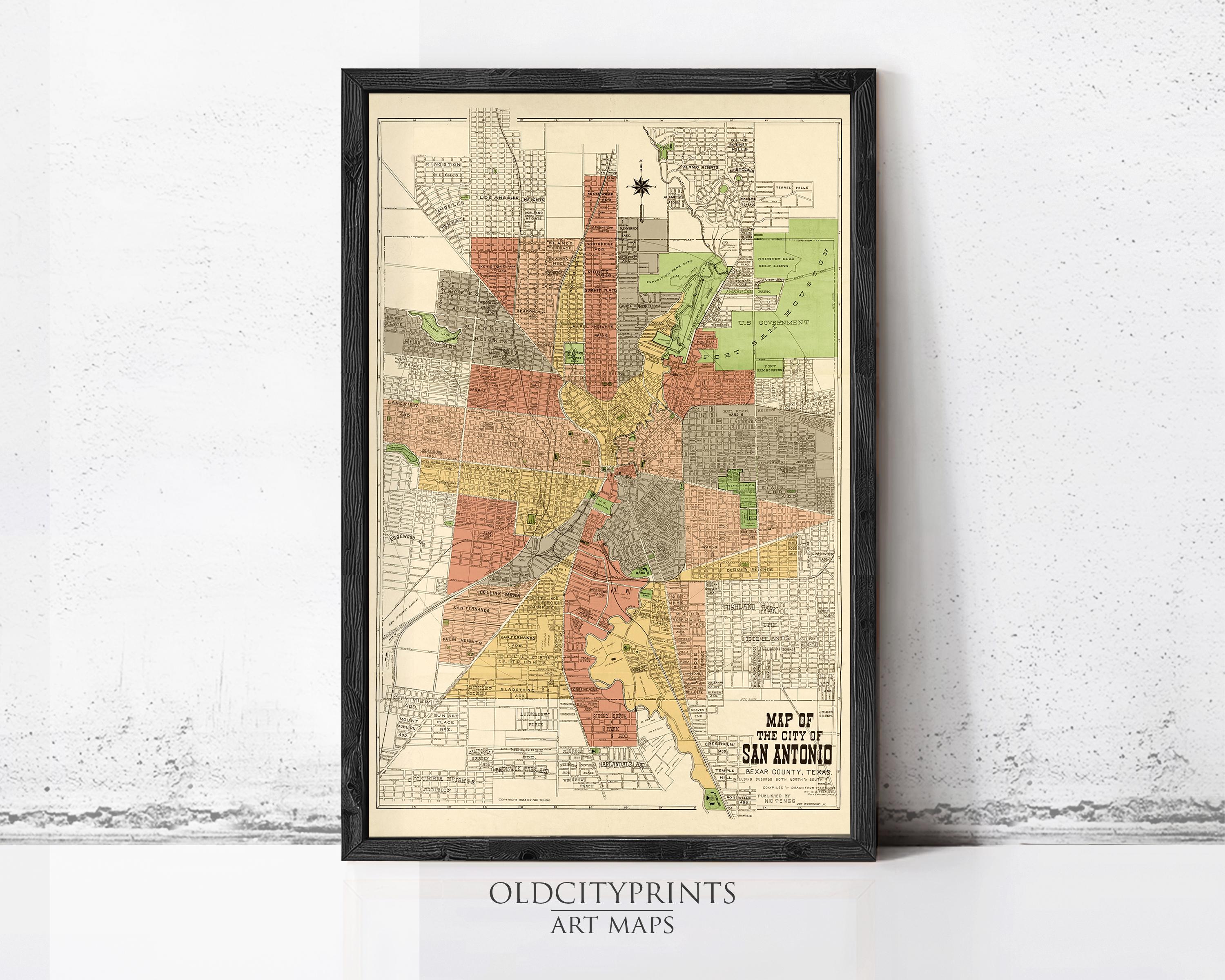 The image is a framed vintage map of San Antonio, Texas, depicting the city's layout and surrounding areas.