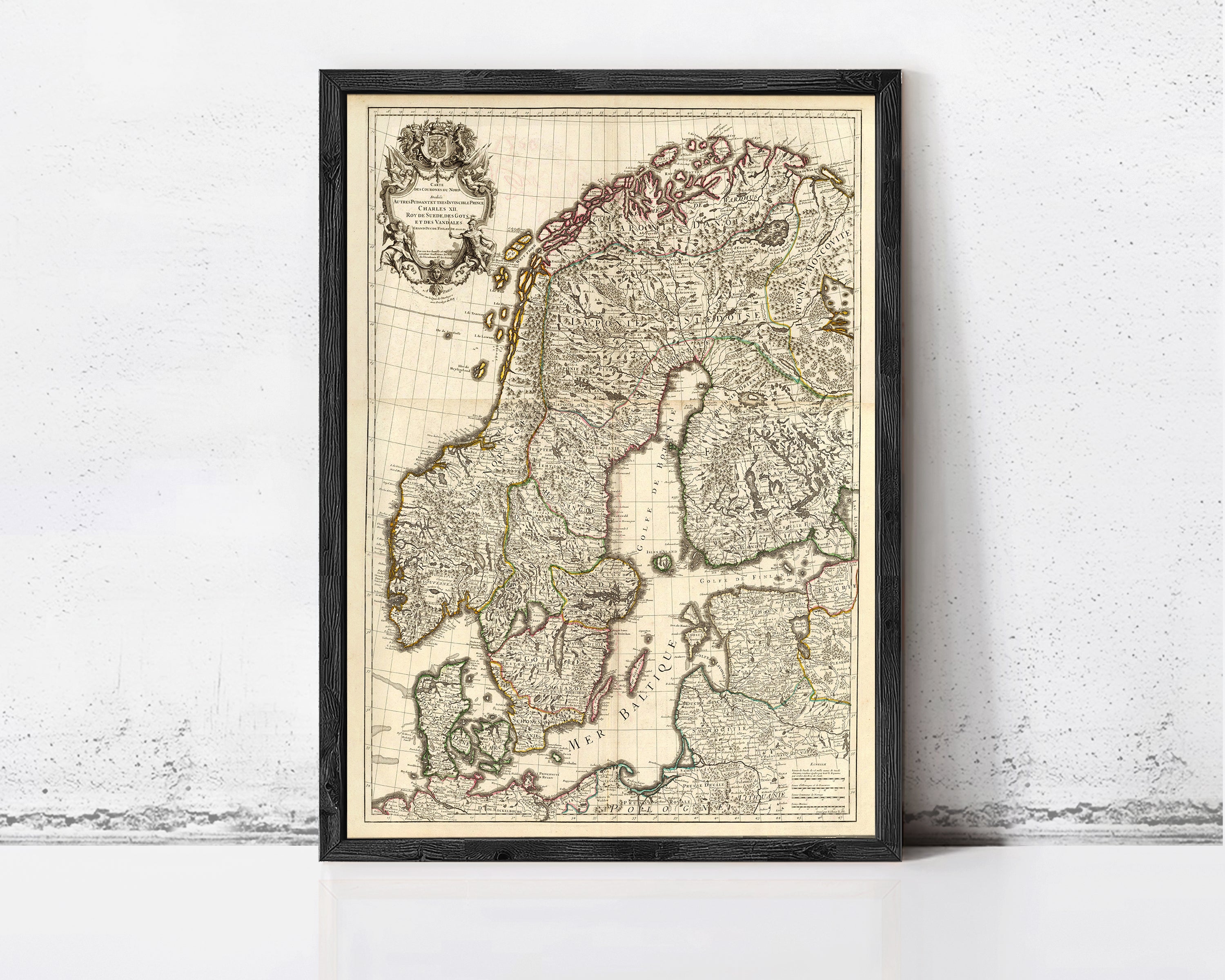 The image is a framed map of Europe, depicting the countries and regions of Europe in a detailed and intricate manner.