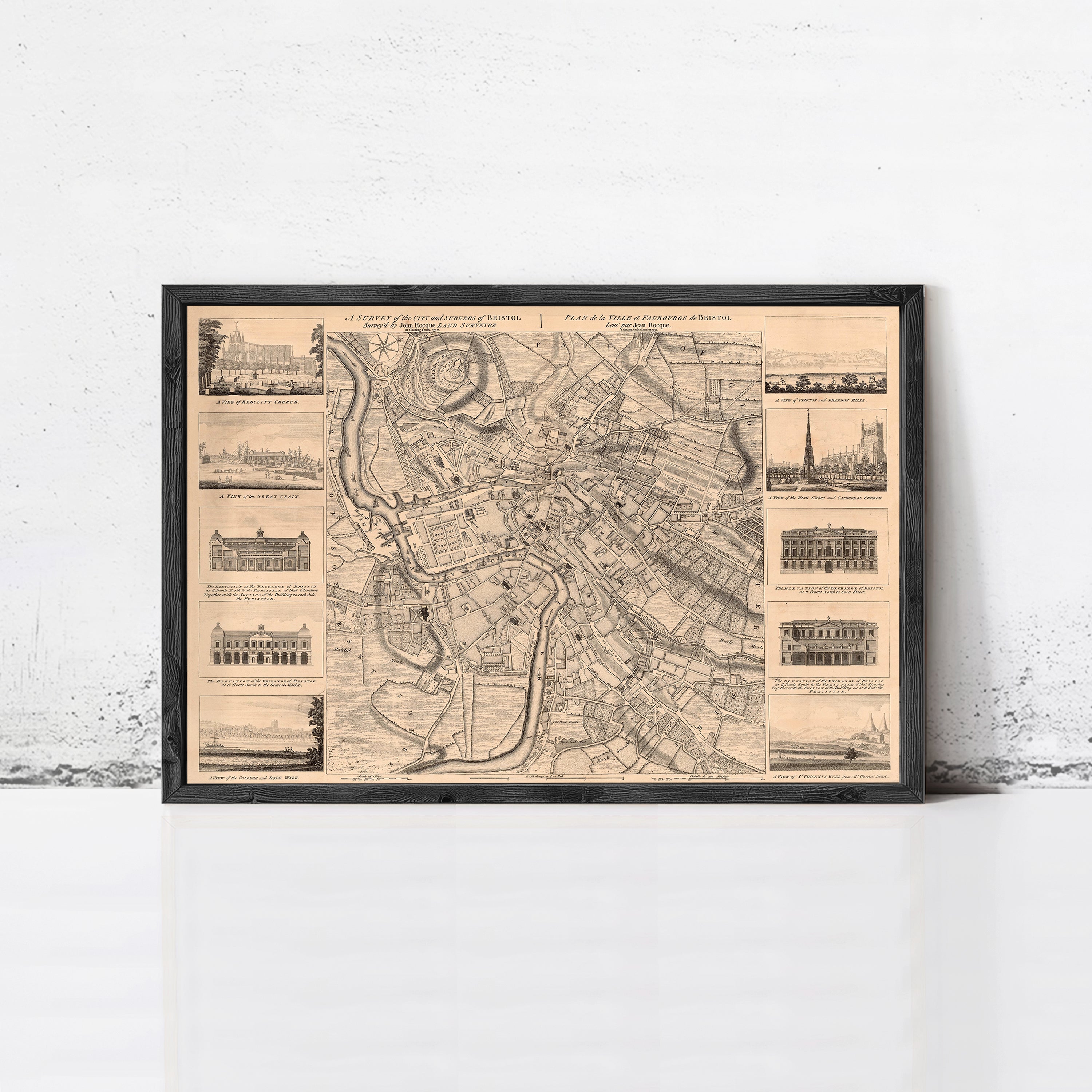 The image is a framed map of a city, showing various landmarks and buildings.