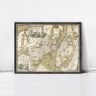 The image is a framed antique map of a city, likely from the 18th century, with detailed cartography and illustrations.