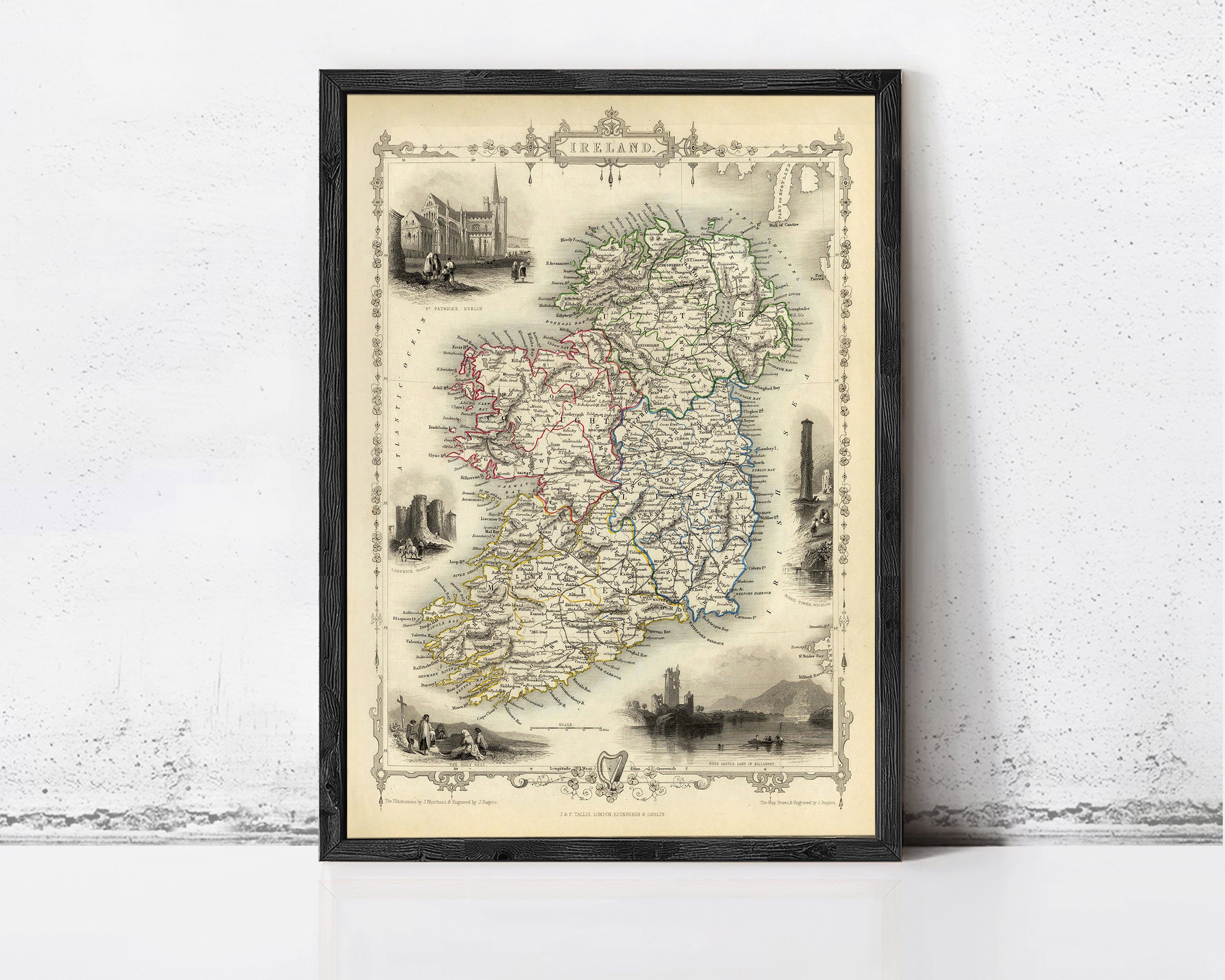 The image is a framed vintage map of Ireland, featuring various landmarks and geographical details.