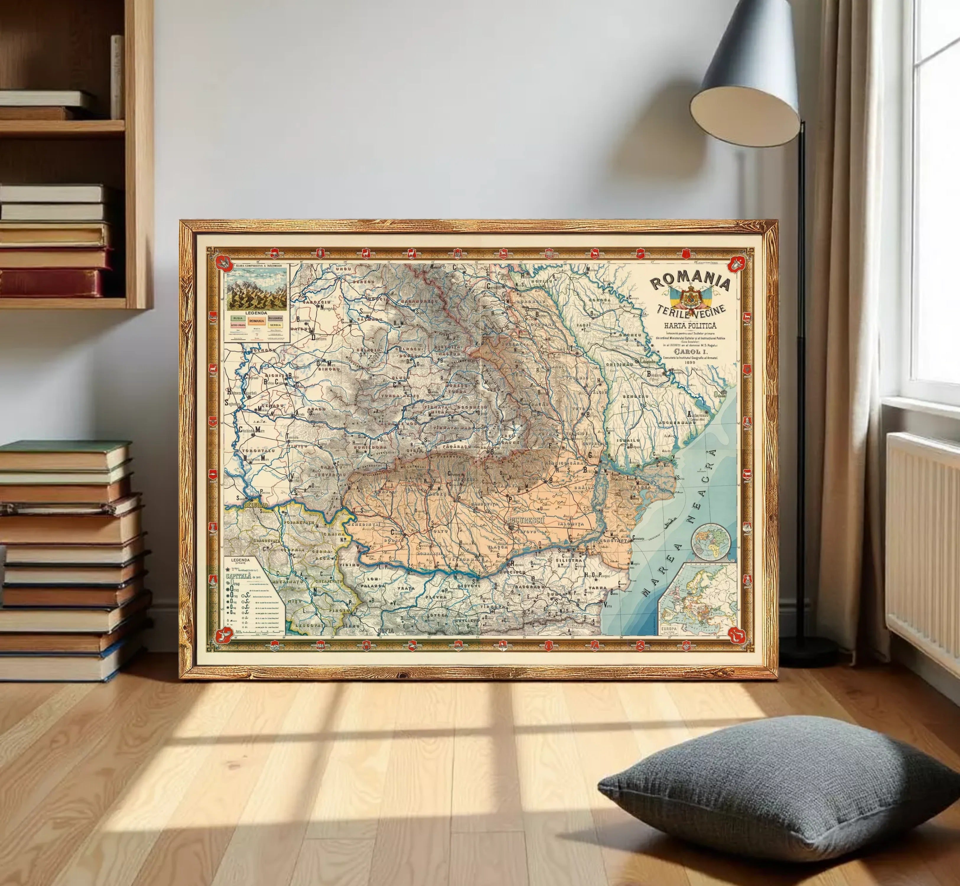 The image is a framed map of Romania, depicting the country's geographical layout and various regions.