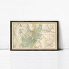 The image is a framed vintage map of the United States, depicting various regions and their geographical features.