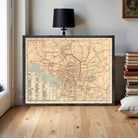 The image is a framed vintage map of Tokyo, Japan, depicting the city's streets and landmarks.